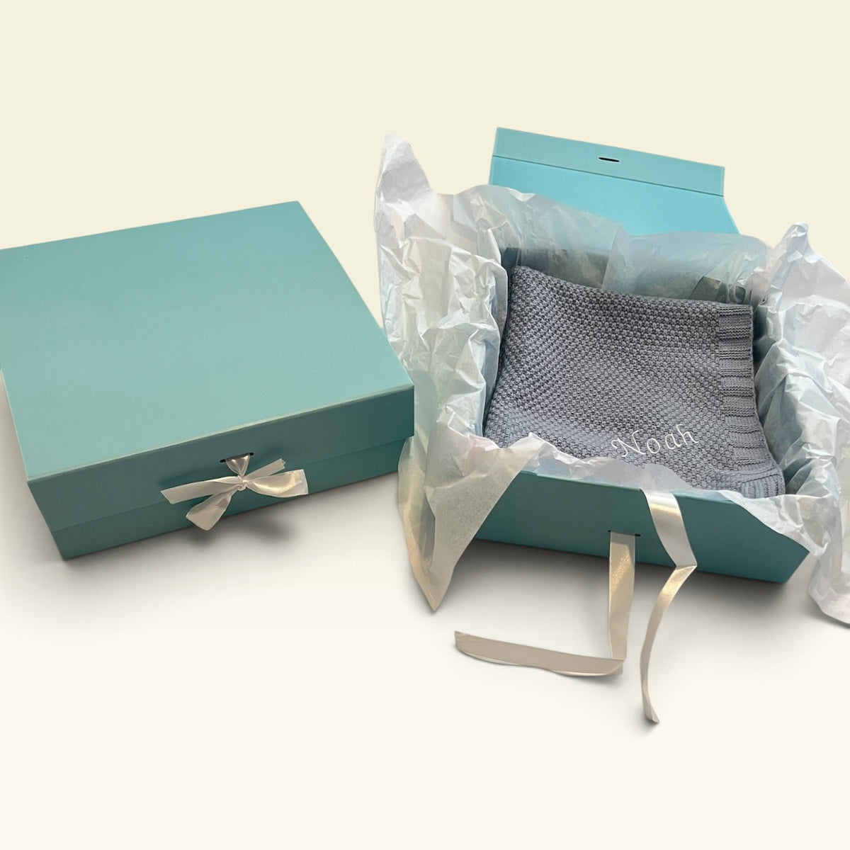 Blue baby keepsake gift box open with tissue paper lining and satin ribbon, newborn gift, can be personalised 