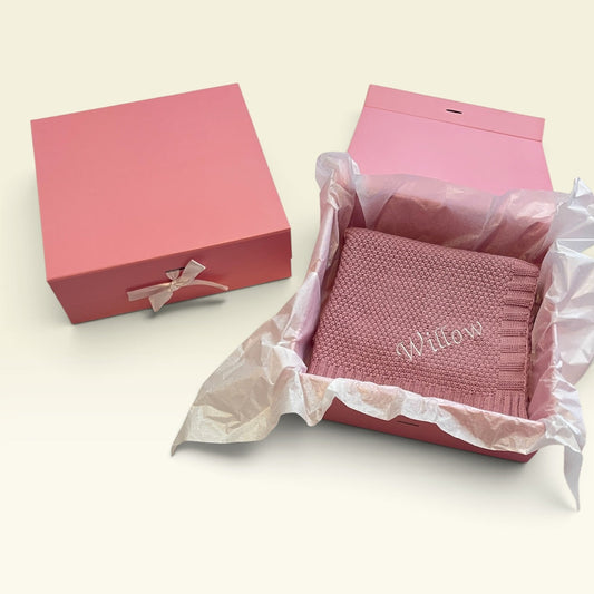 Pink keepsake gift box open beside closed box with satin bow, tissue paper lining, baby gift, can be personalised